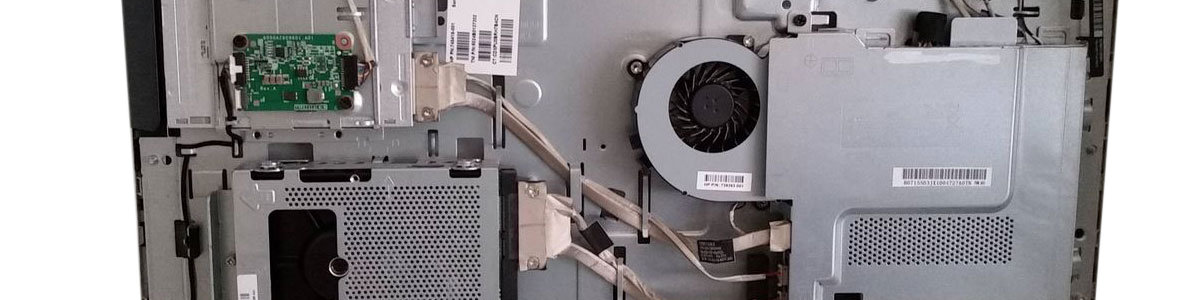 All-in-one computer with rear cover removed showing internal components