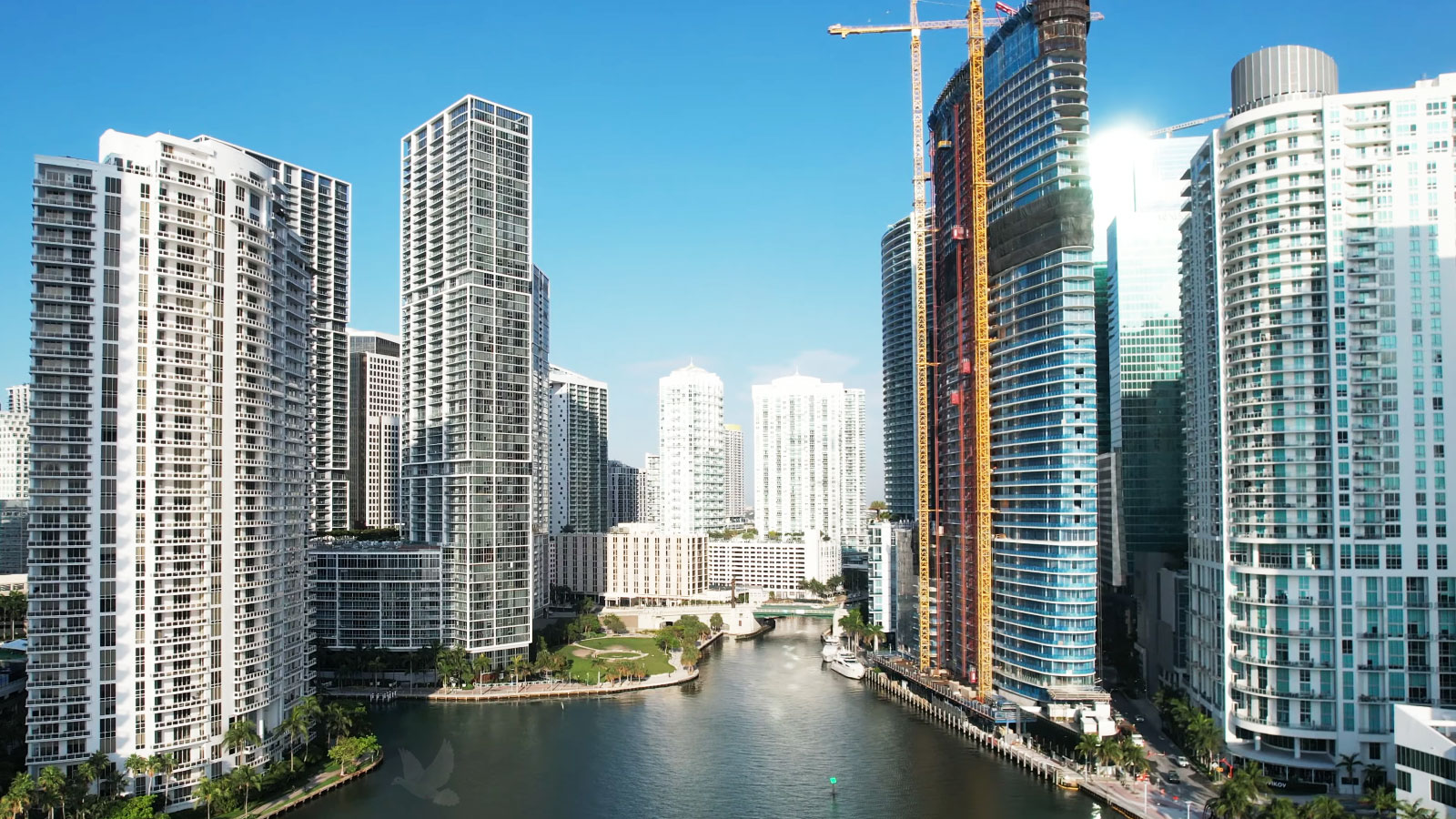 Brickell Miami high-rise buildings lining both sides of a waterfront canal
