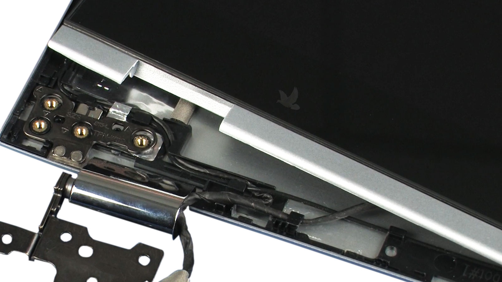 Damaged left laptop hinge exposed for inspection and structural repair