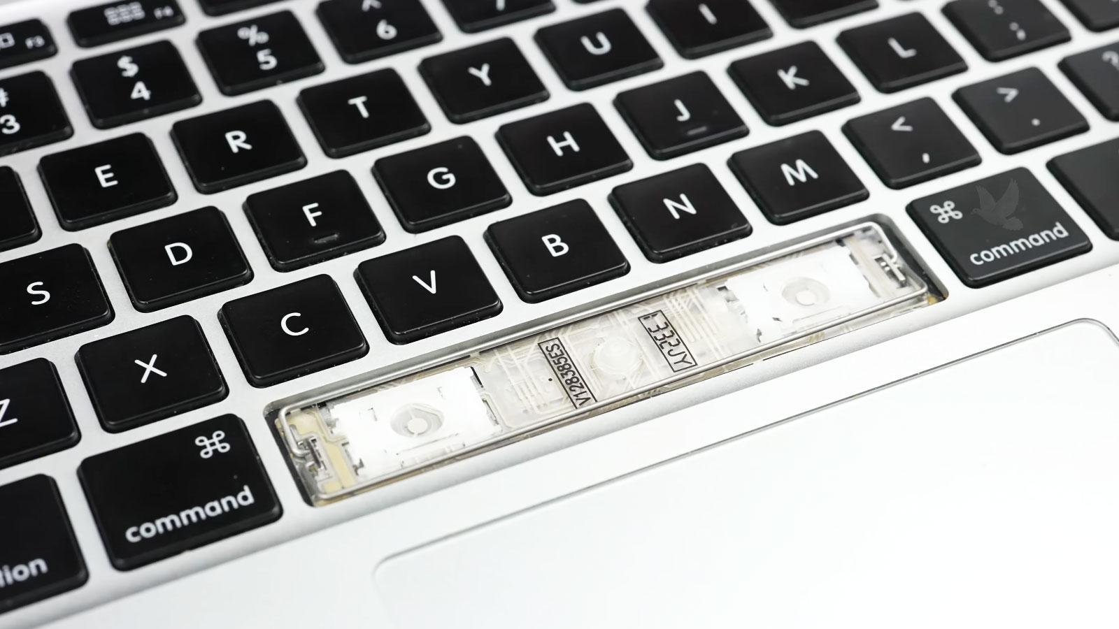 MacBook-Keyboard-Replacement-for-Damaged-Space-Bar MacBook keyboard being replaced after damage to the missing space bar