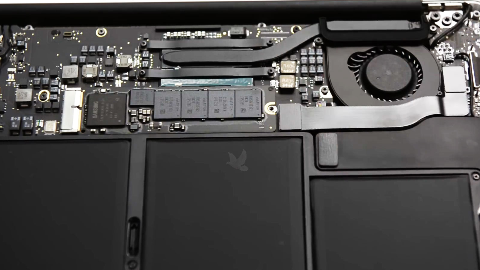 Removable SSD being prepared for removal from a 2015 MacBook Air for data recovery and transfer