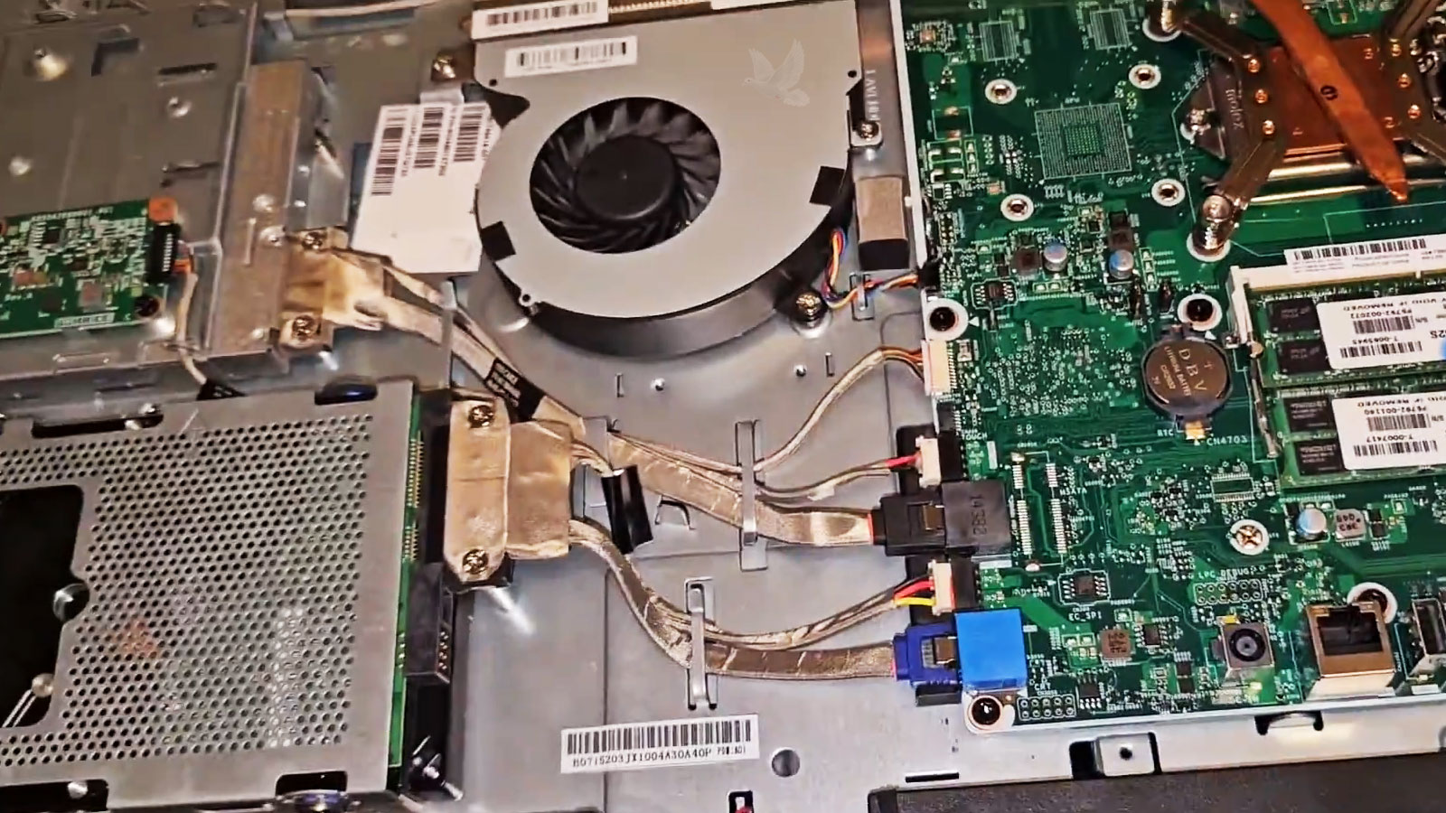 All-in-One-Computer-Hard-Drive-Replacement-with-SSD Older 3.5-inch hard drive in an all-in-one computer being replaced with an SSD