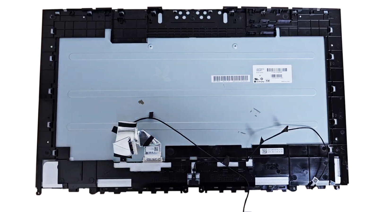 Damaged LCD screen removed from an all-in-one computer for replacement