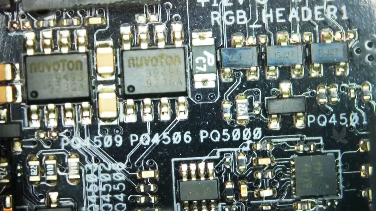 Desktop-Motherboard-Short-Circuit-Repair Shorted controller near two Nuvoton chips identified during desktop motherboard repair