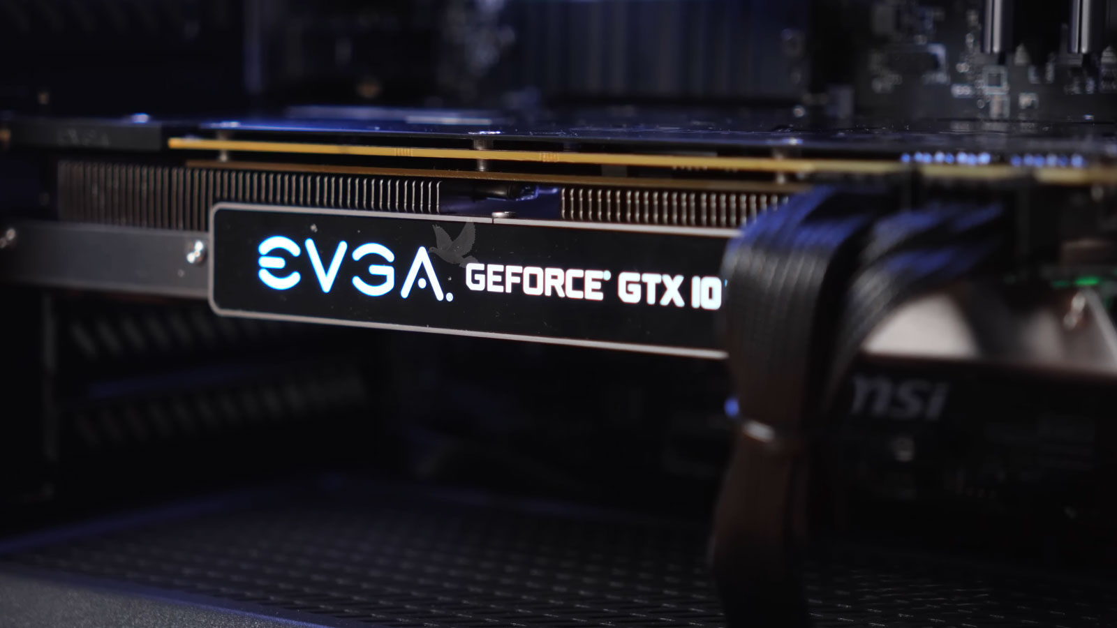 Gaming PC repair troubleshooting an EVGA GeForce GTX graphics card that powers on but produces no video output