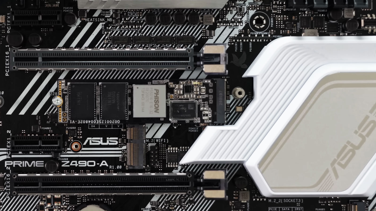 ASUS Prime Z490-A motherboard installation during a gaming PC hardware upgrade