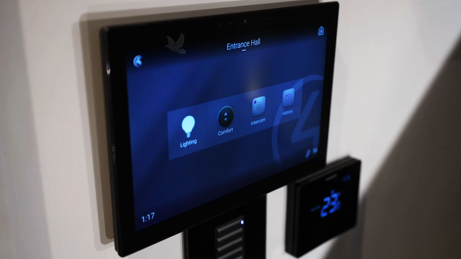 Home automation touchscreen displaying entrance hall controls for lighting comfort and intercom