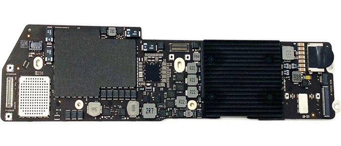 MacBook Air logic board removed for circuit-level inspection