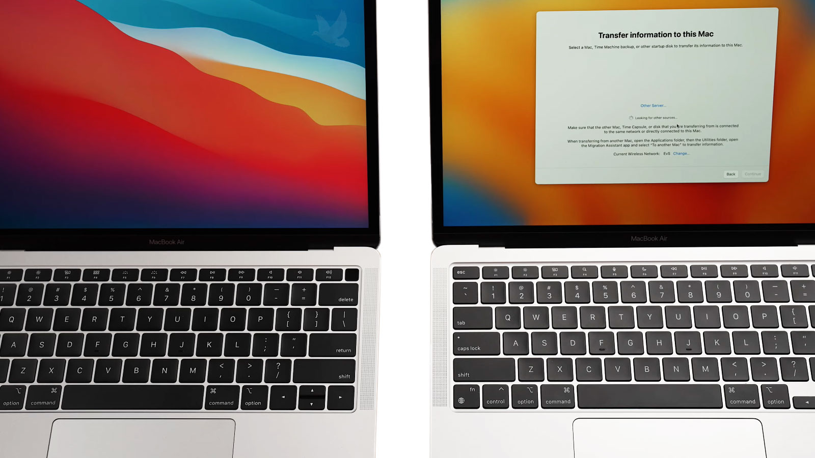 Two MacBook Pro computers transferring information from one Mac to another
