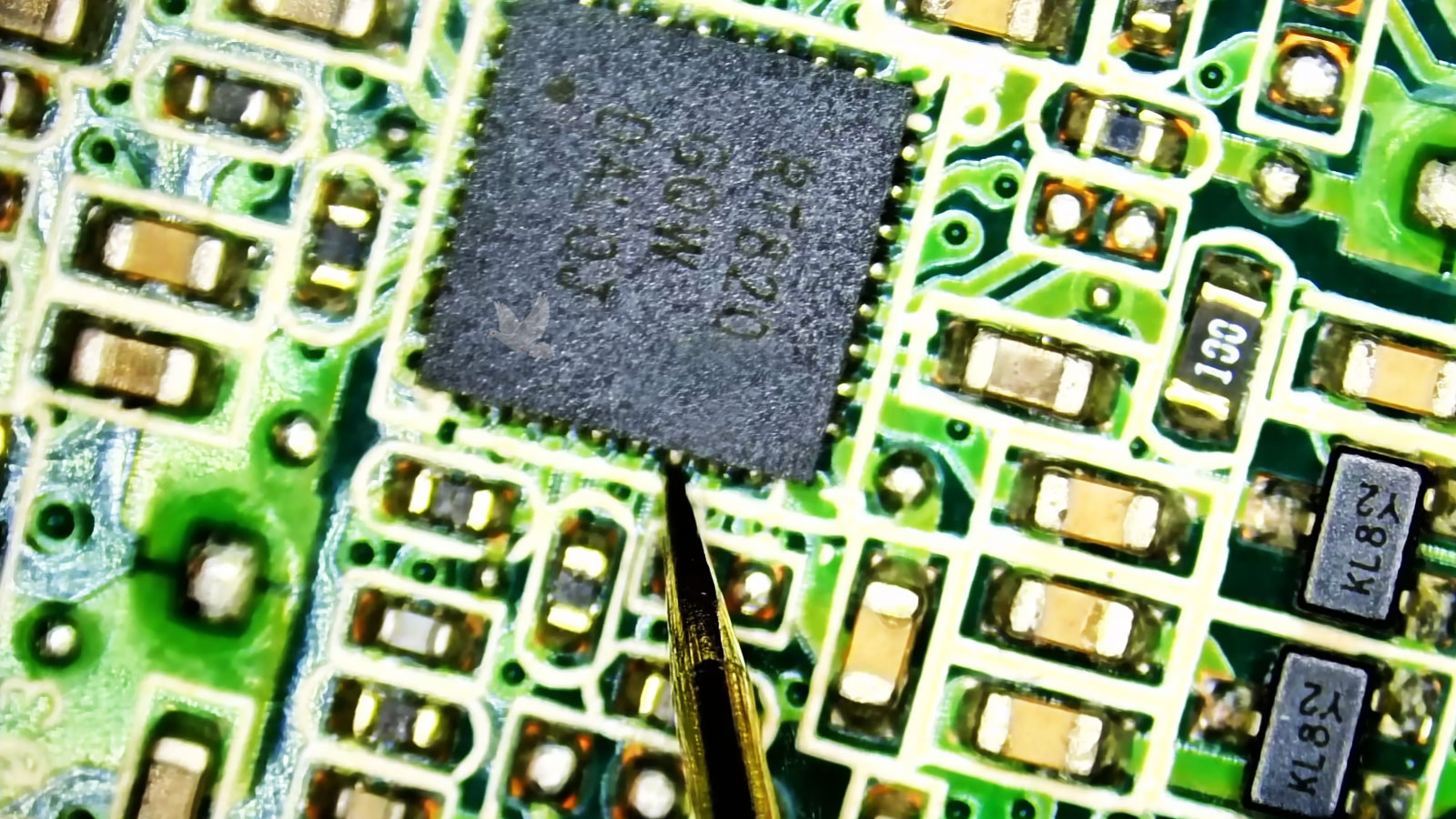 Motherboard-Faulty-IC-Chip-Diagnosis Computer motherboard repair diagnosing a faulty IC chip that requires replacement