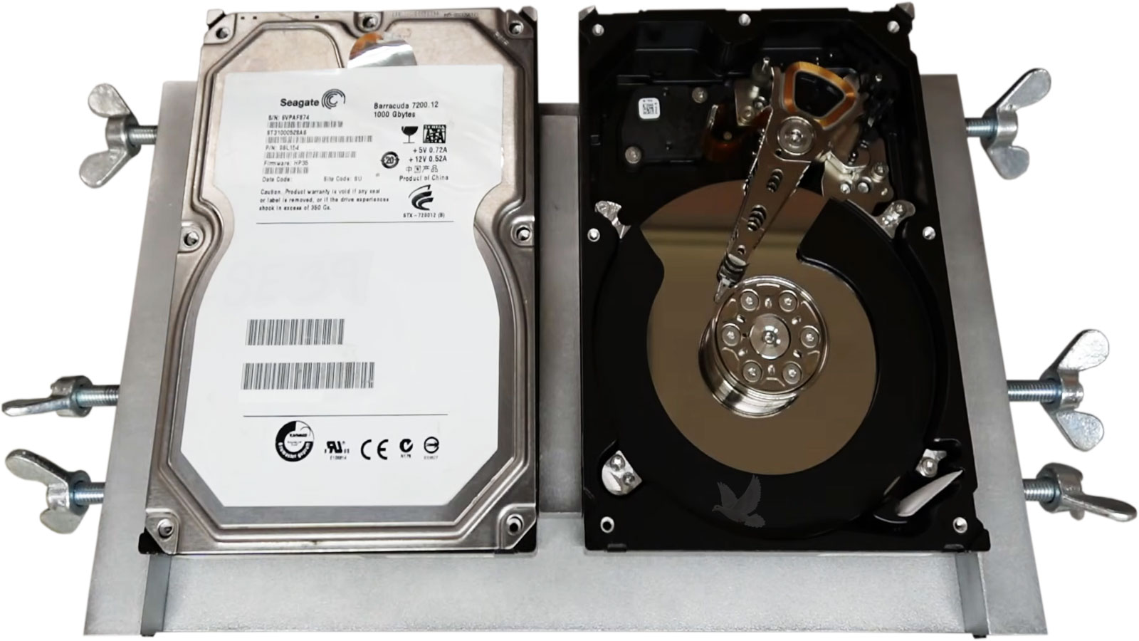 Seagate-Hard-Drive-Data-Recovery-with-Donor-Drive Two Seagate 3.5-inch hard drives mounted for data recovery using an original and donor drive