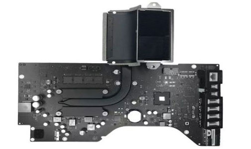 iMac logic board with CPU heatsink removed for inspection and repair