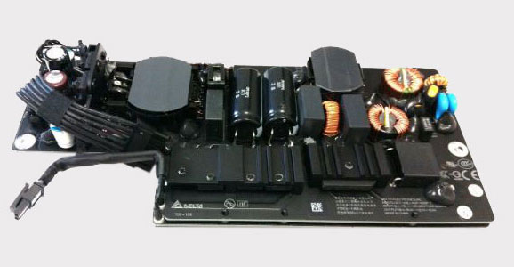 Removed iMac power supply ready for diagnostic testing and repair