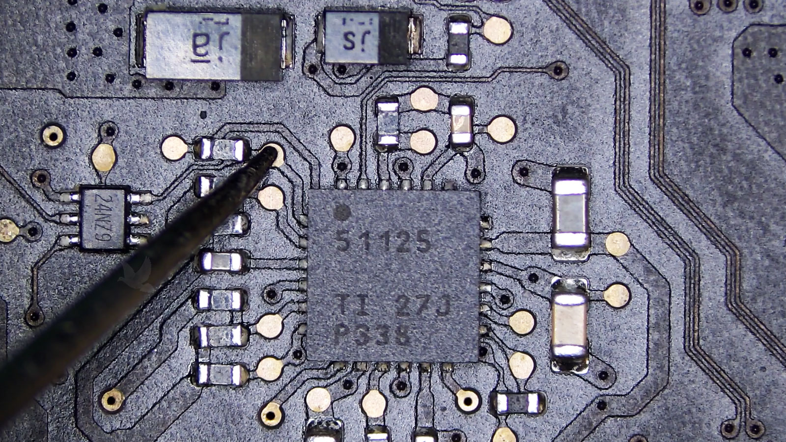 51125 IC tested at a connected pad showing low voltage on the expected 6V supply line