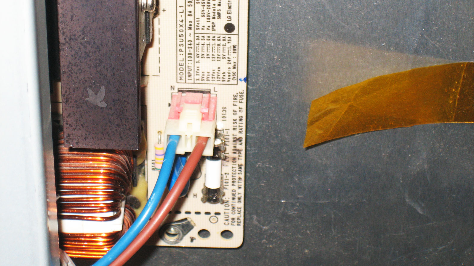 Blown fuse with suspected damaged bridge rectifier beneath metal shield