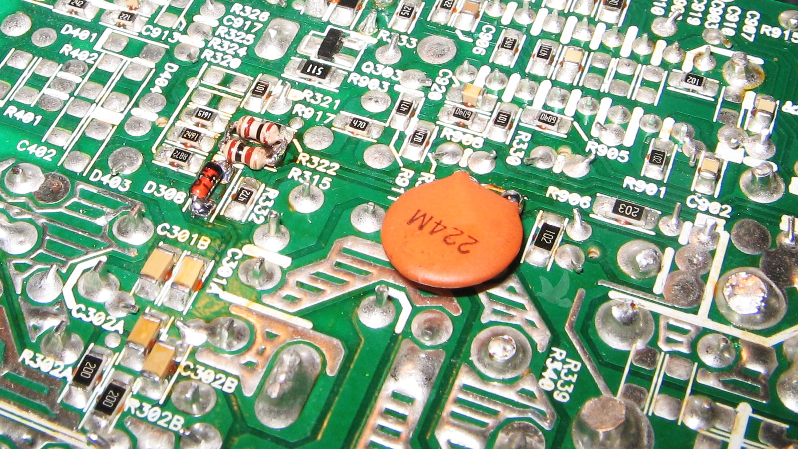 Back of a circuit board showing a custom-installed Zener diode, parallel resistors R322 and R315, and an additional soldered component near the 224M marking.