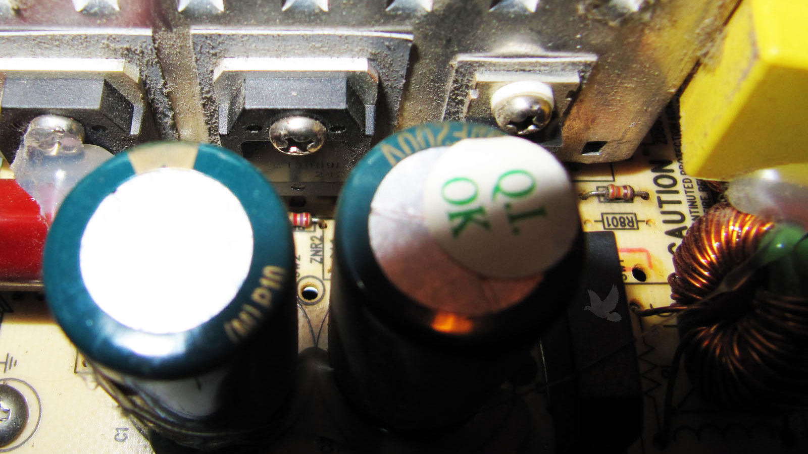 Dusty bridge rectifier with a damaged rectifier on power supply circuit board