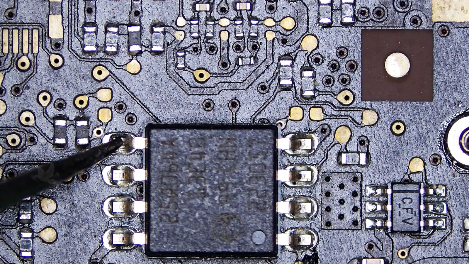 Eight-pin IC being measured at a supply pin where the required 12 volts are missing