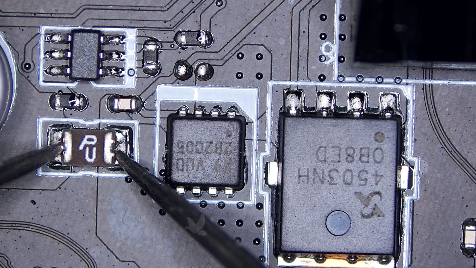 Blown fuse beside two MOSFETs after the larger MOSFET developed a severe short circuit