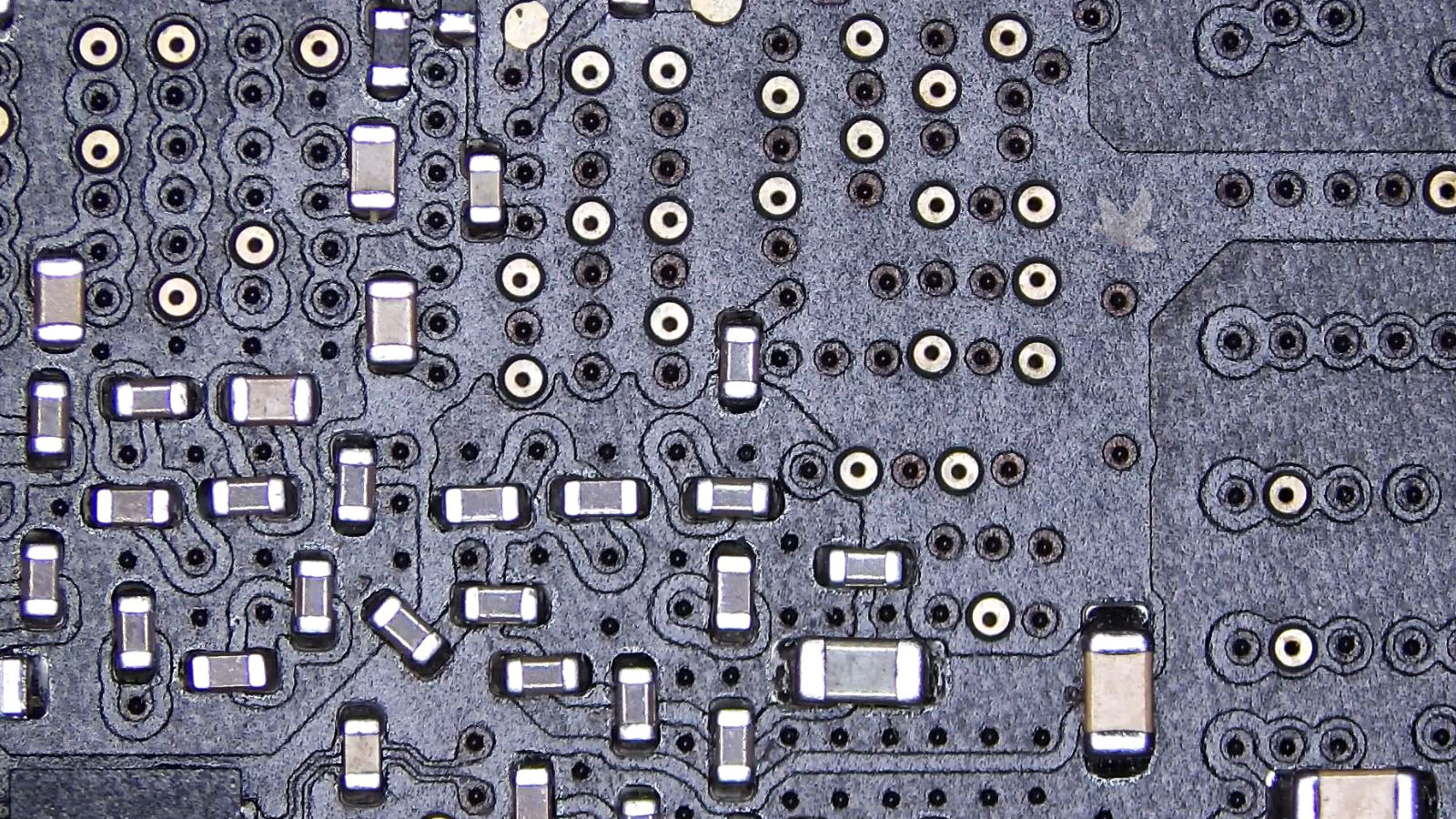 Group of SMD capacitors in the same circuit section all measuring shorted on a shared power rail