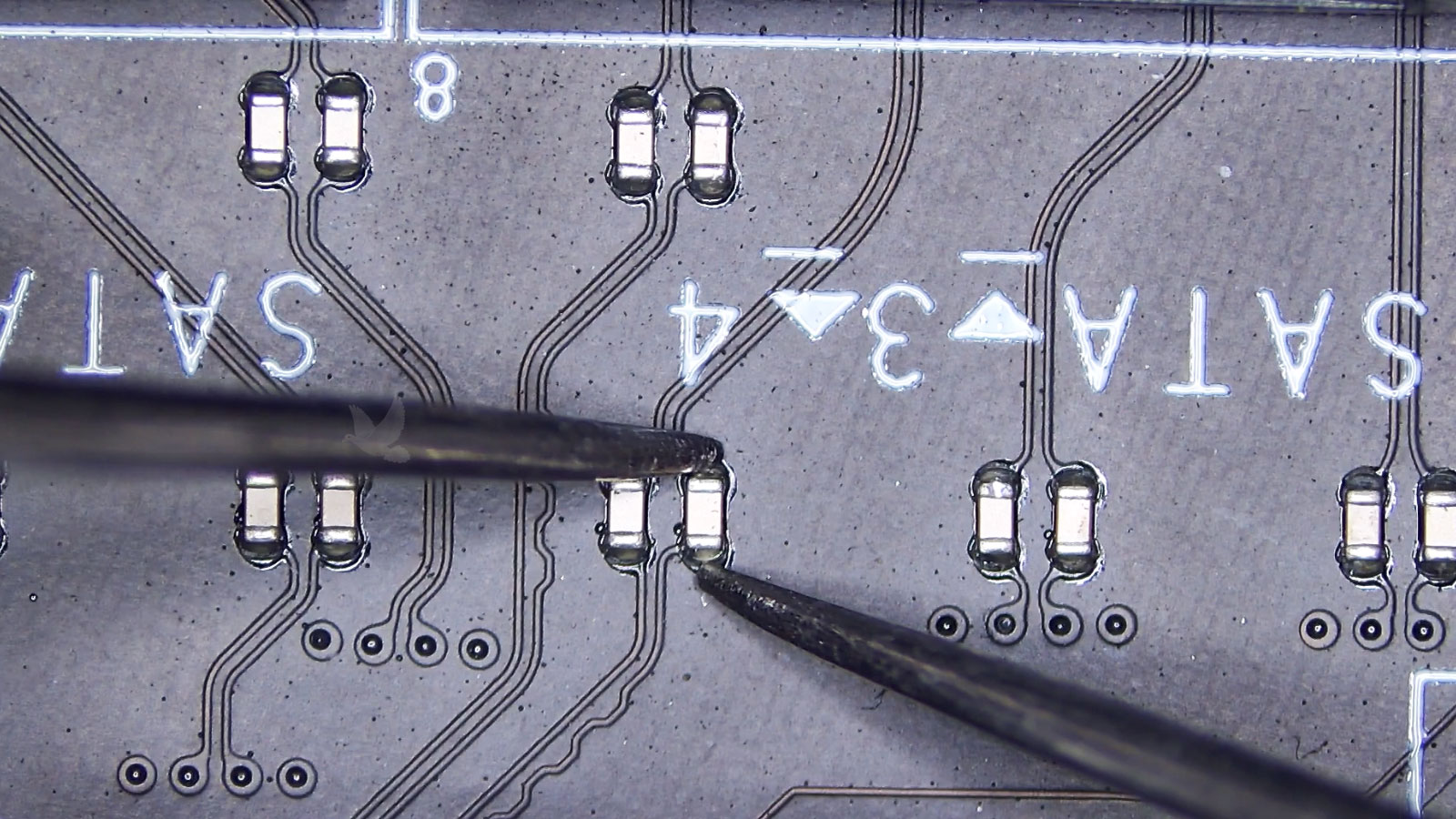 Shorted capacitor on the right side of a parallel capacitor pair bringing down the circuit line