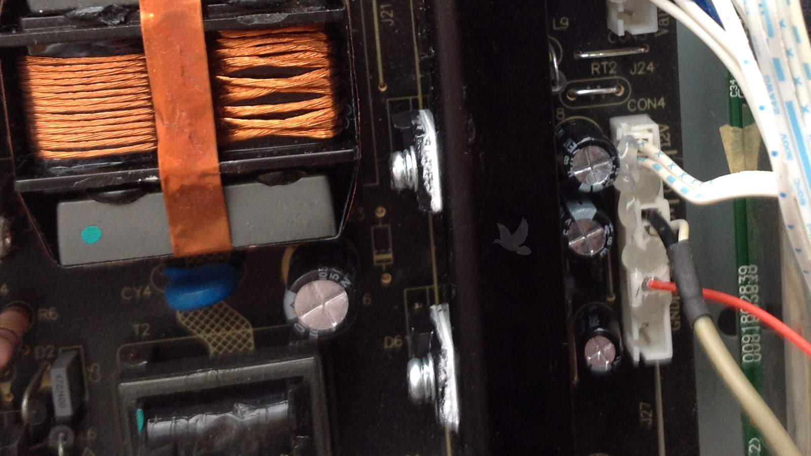New bridge rectifier installed with thermal paste on repaired power circuit board