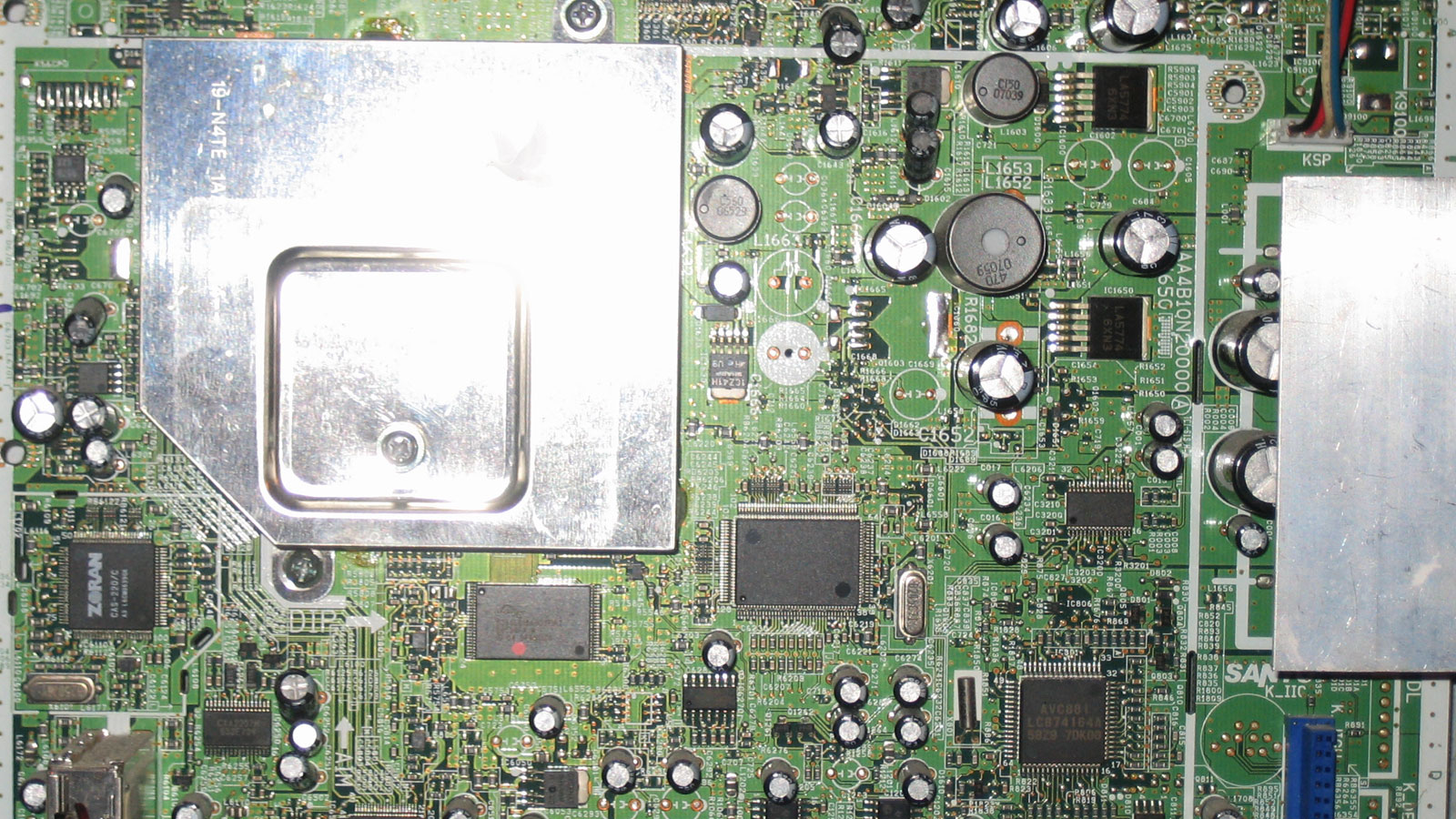 Motherboard with newly replaced capacitors installed on the circuit board