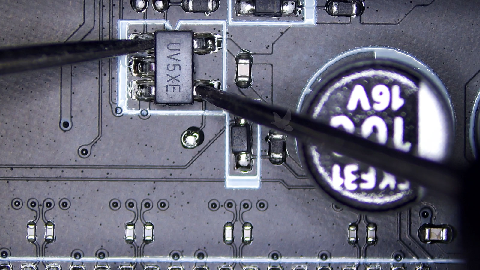 Transistor testing normally beside diodes and 16V capacitor on circuit board