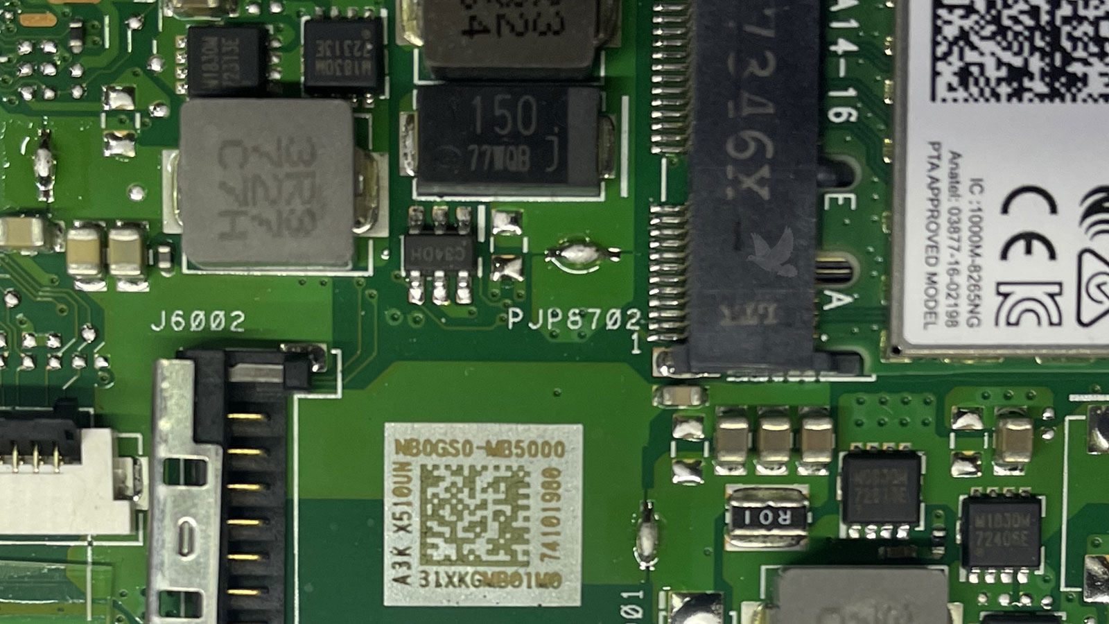 Two tiny MOSFETs replaced next to R01 resistor on computer motherboard
